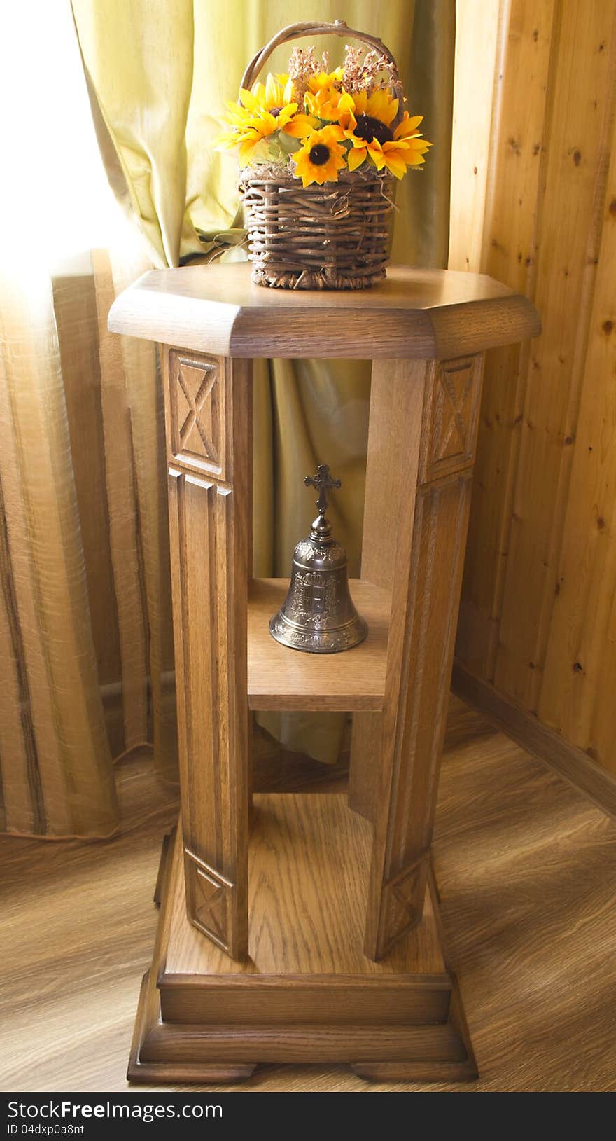 Wooden stand for flowers in interior