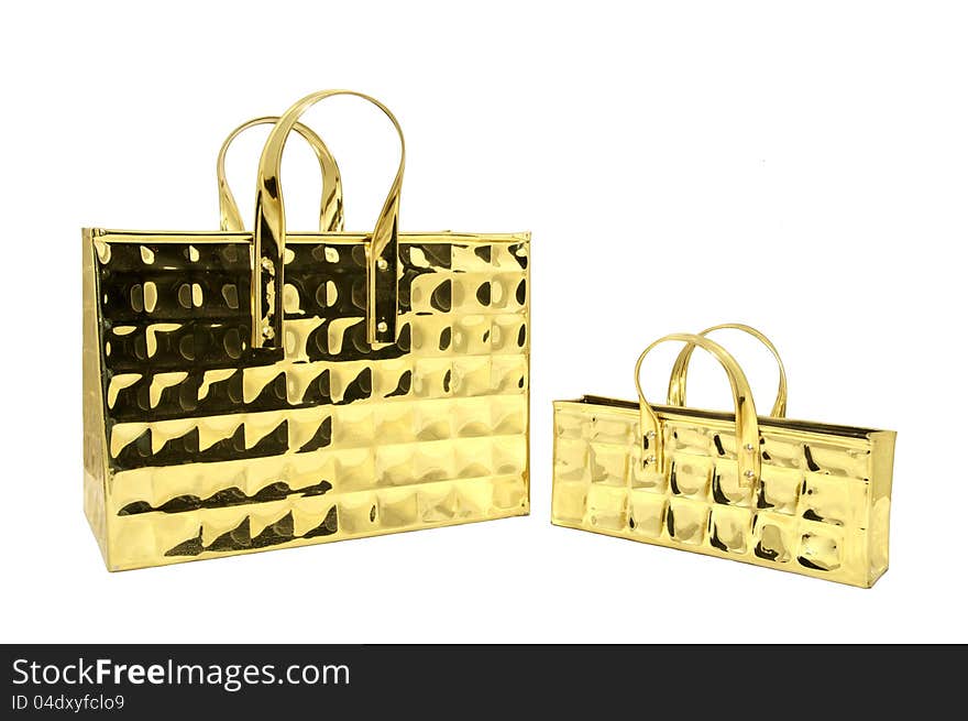 Two brass decorative bags on white background. Two brass decorative bags on white background