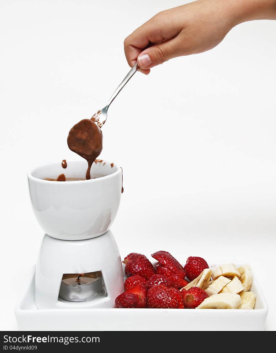 Eating fondue on white background