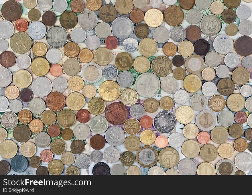 The background of the different coins and notes, texture