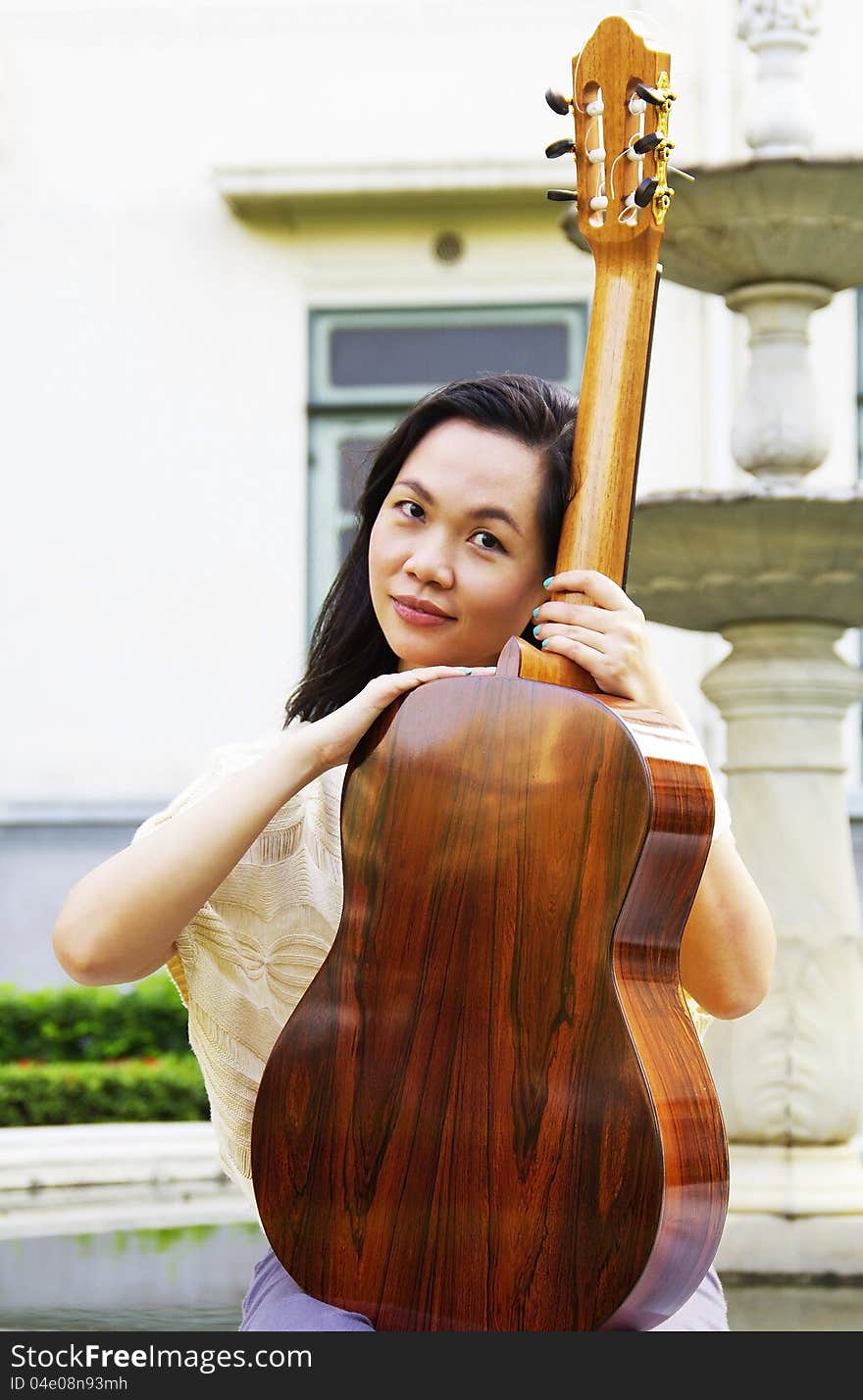 Young woman with guitar