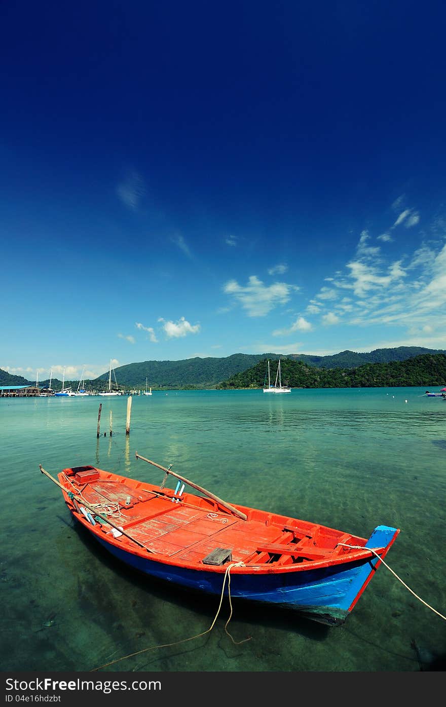 Place: The fishing village.In Koh Chang Trat Thailand Life of a fisherman in lazy day in Koh Chang Beautiful sky and blue sea. Place: The fishing village.In Koh Chang Trat Thailand Life of a fisherman in lazy day in Koh Chang Beautiful sky and blue sea