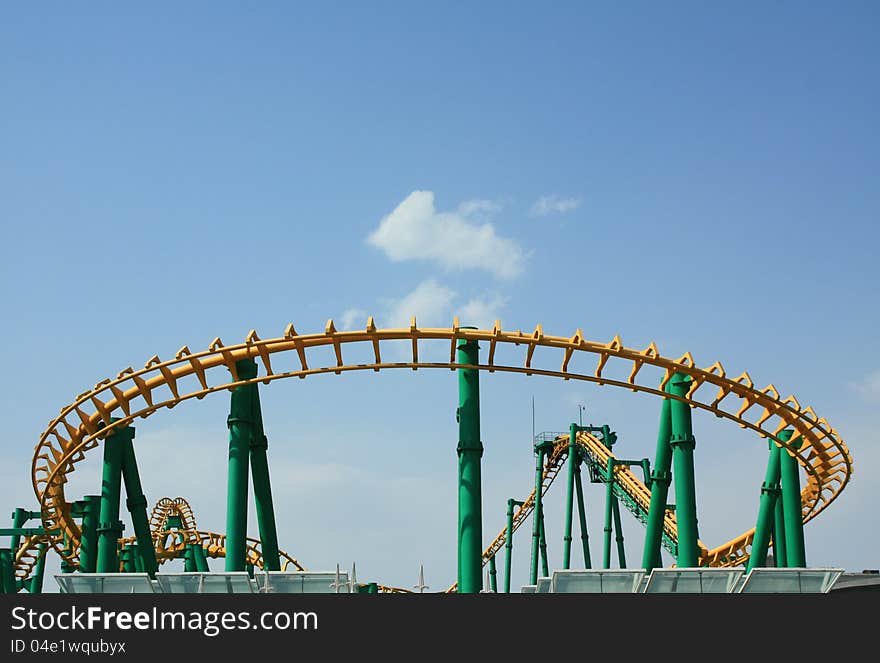 This is a roller coaster photo in a park.