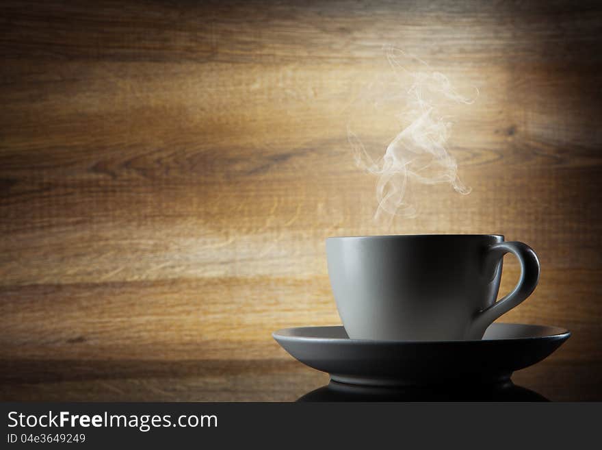 Coffee Cup On Wooden Background