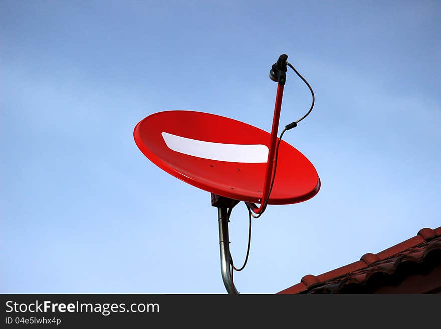 Red Satellite dish on the roof