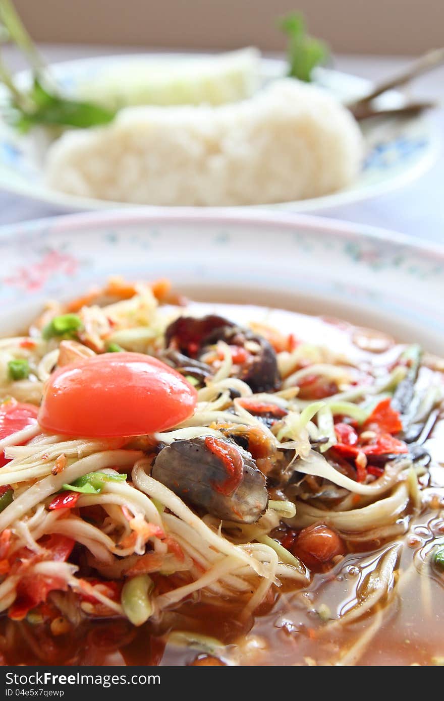 Thai Papaya Salad with fermented crab or Thais call somtampu