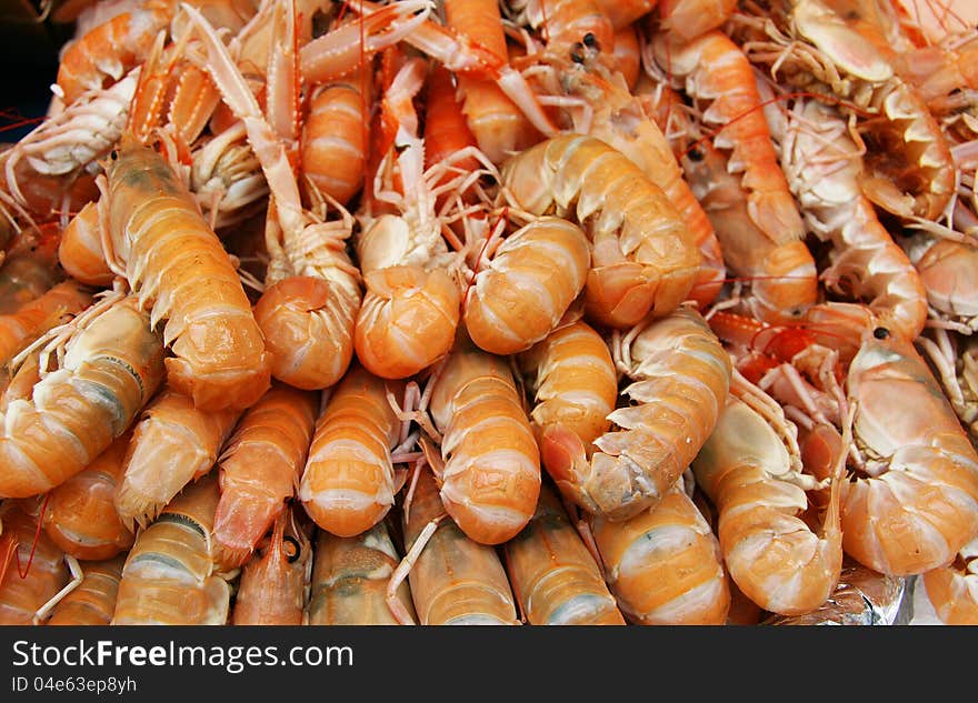 Fresh shrimp at the market - food background. Fresh shrimp at the market - food background