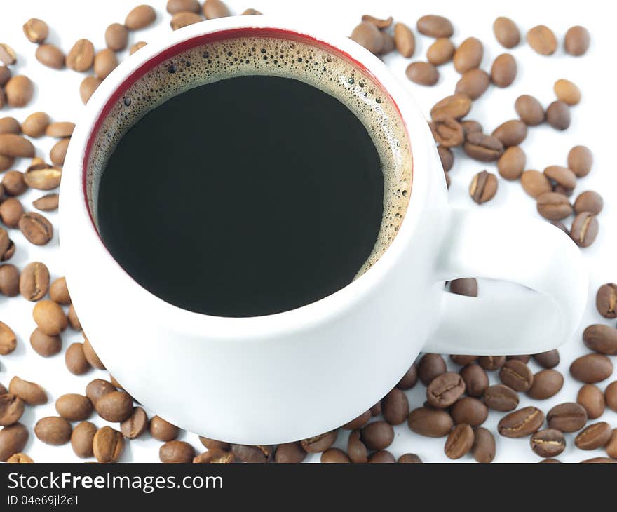 Coffee cup and coffee beans