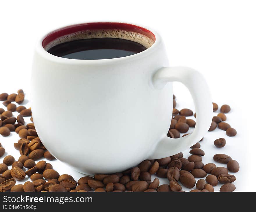 Coffee cup and coffee beans