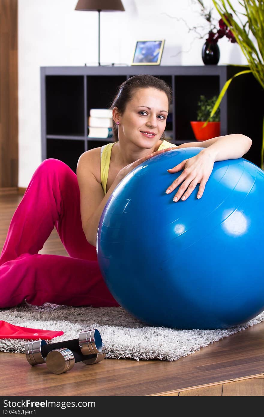 Young woman in sport dress in the flat. Young woman in sport dress in the flat