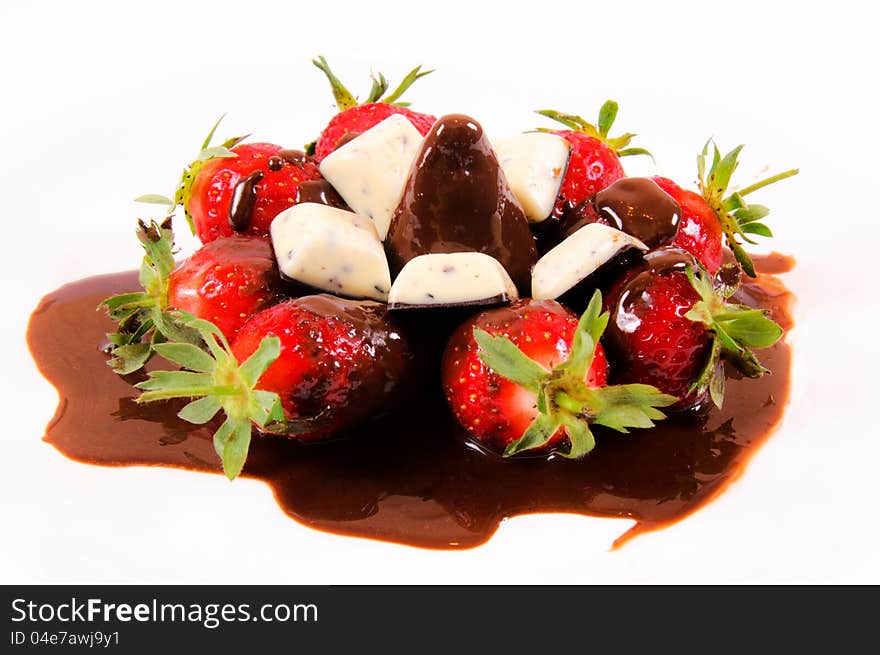 Strawberries in chocolate isolated on white. Strawberries in chocolate isolated on white