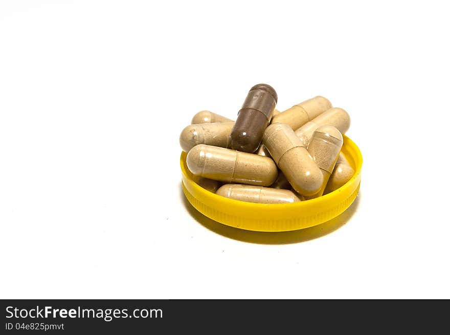 The ancient herbal capsule in yellow cap