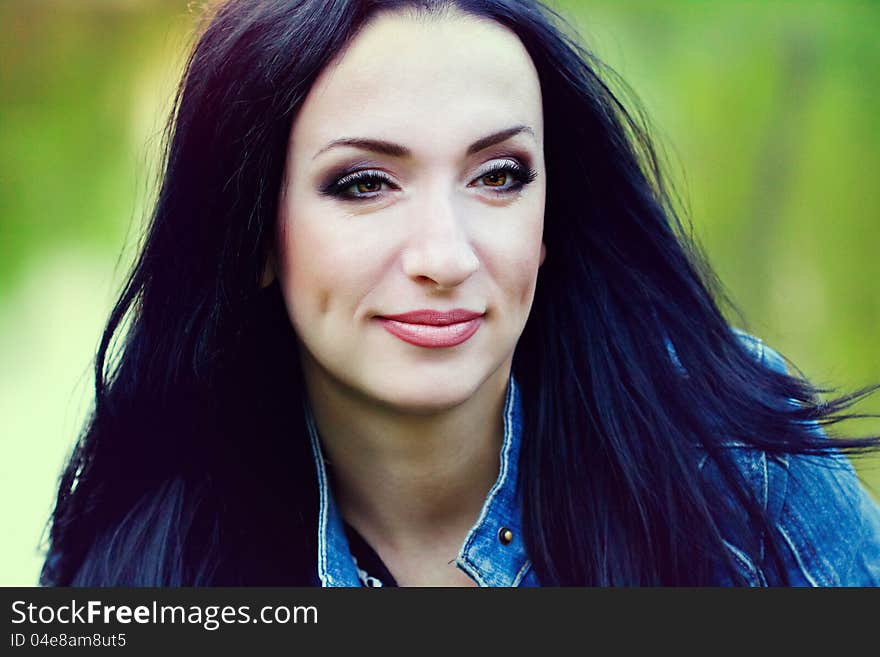 Beautiful brunette in the park