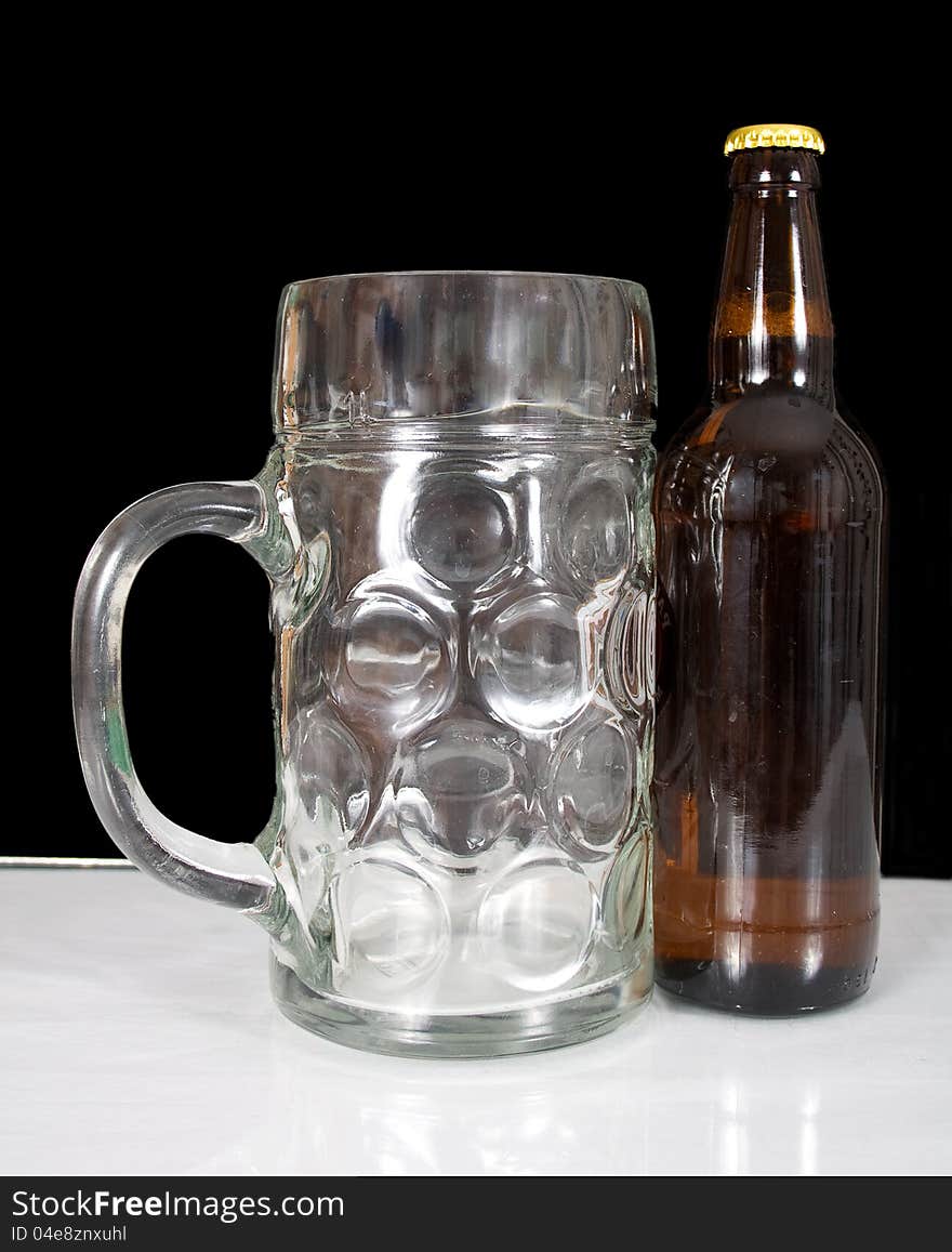 Glass And A Brown Bottle Of Beer