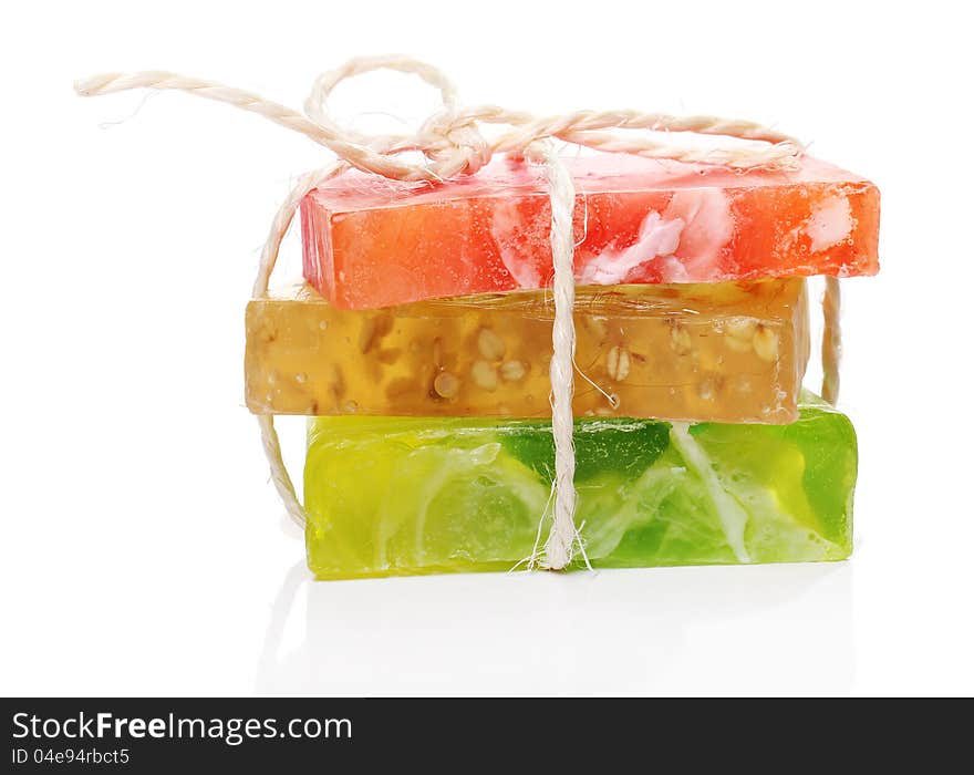 Colorful natural soap on white background