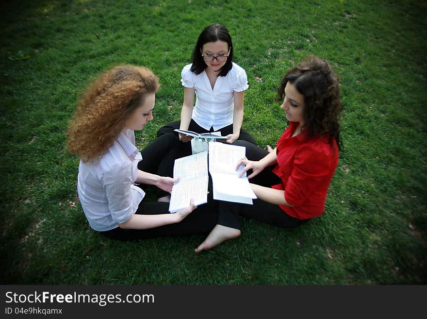 Preparing for the exams on the green grass. Preparing for the exams on the green grass