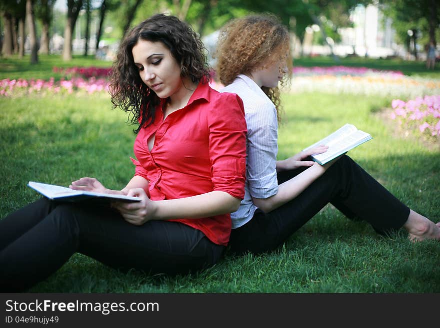 Two friends learn lessons outdoors summer