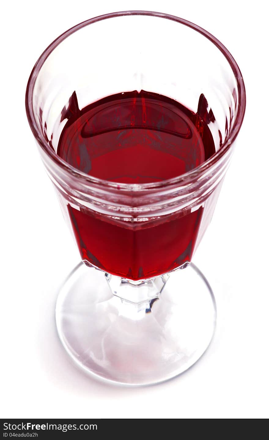 Glass of red wine on a white background. Glass of red wine on a white background.