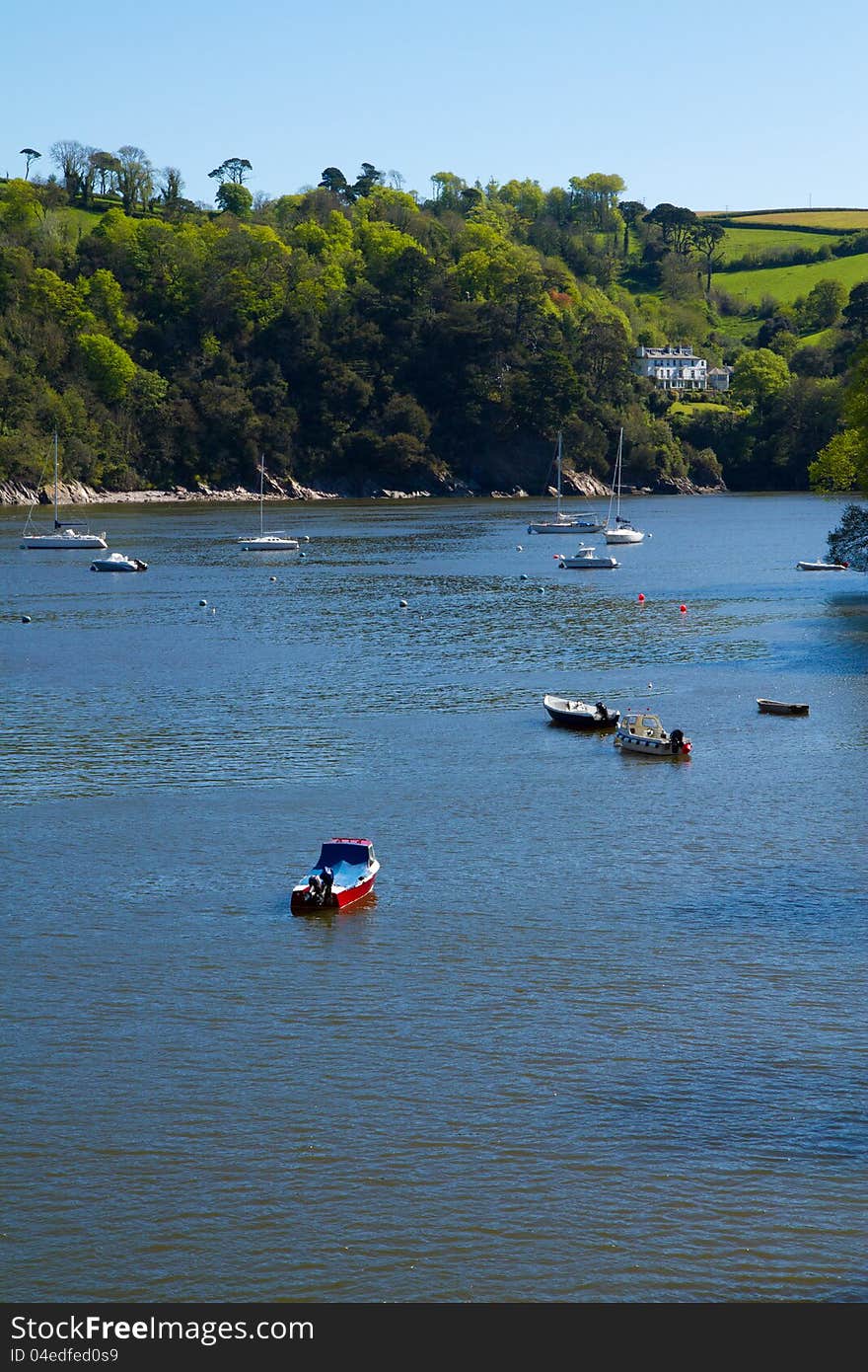 Boats on the River Dart on a beautiful day