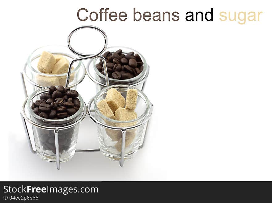 Coffee beans and sugar in glass