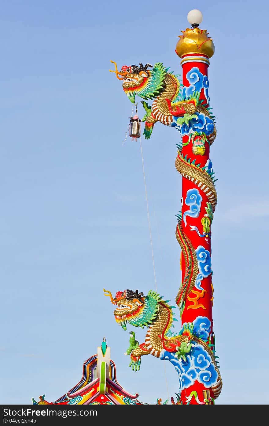 Chinese style dragon statue on blue sky