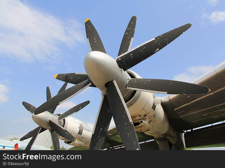 Strategic bomber propeller engine  against  cloudy sky background. Strategic bomber propeller engine  against  cloudy sky background