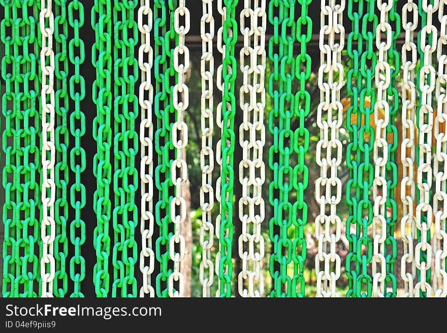 Green and white plastic chain, texture background