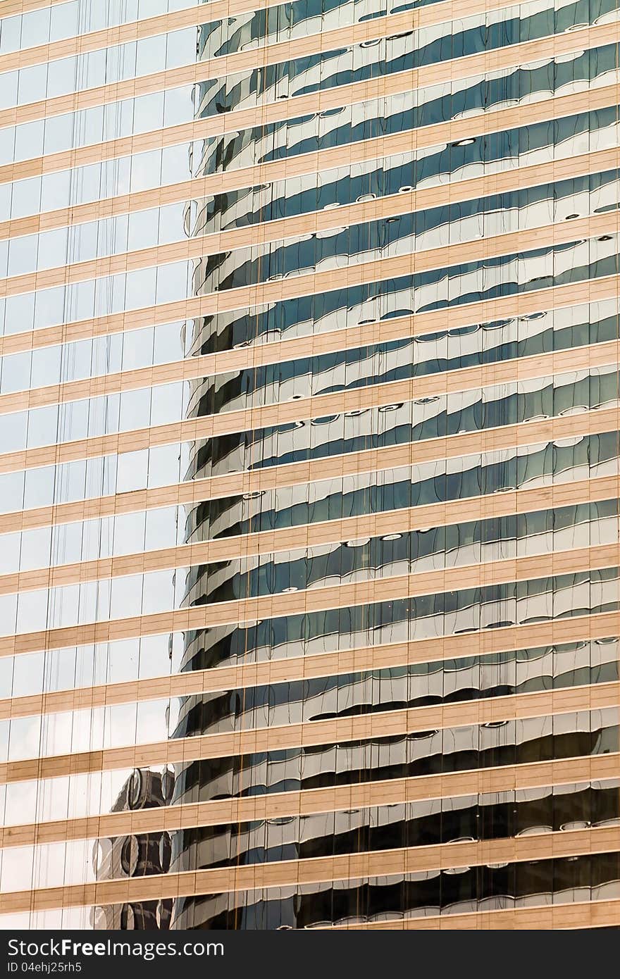 Reflection of the modern building of business center. Reflection of the modern building of business center.