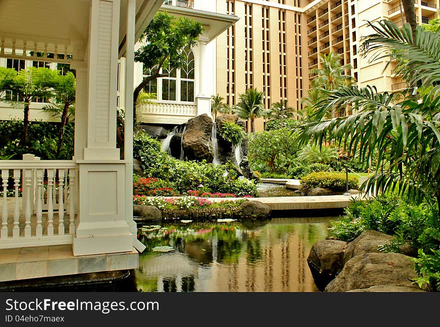 A serene garden at a tropical resort. A serene garden at a tropical resort