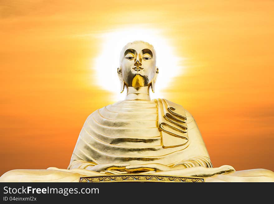 Big buddha statue with sunset. Temple of Thailand