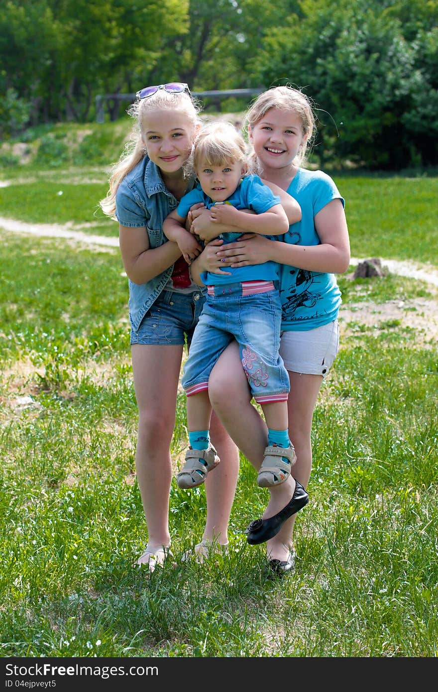 Three sisters indulge and have fun on a walk