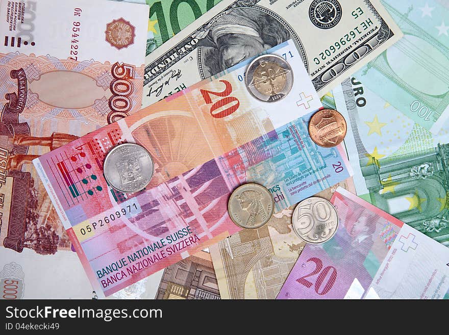 Colorful  World Paper Money and coins background. Colorful  World Paper Money and coins background