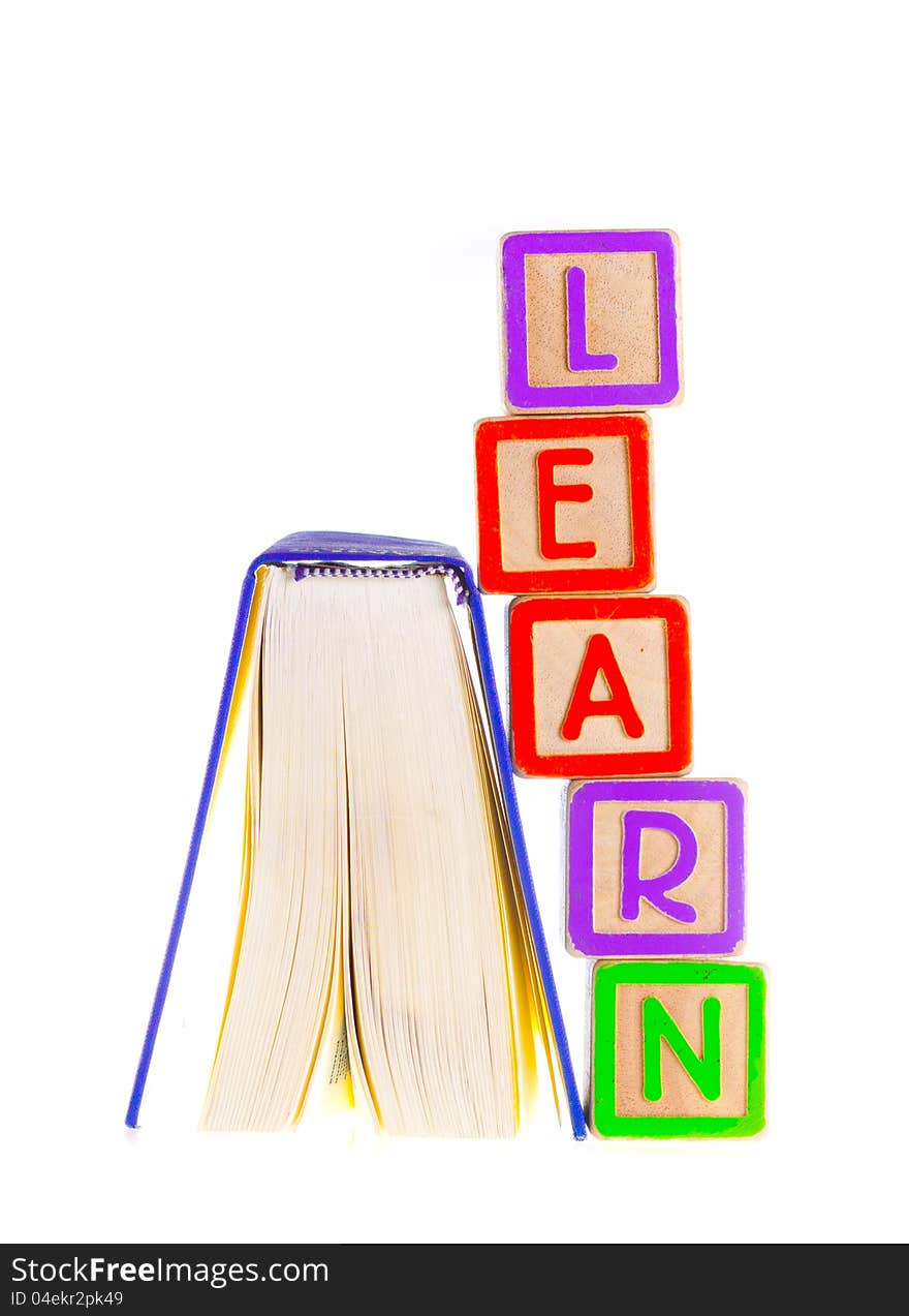 Learn Spelled Out Leaning on Open Book