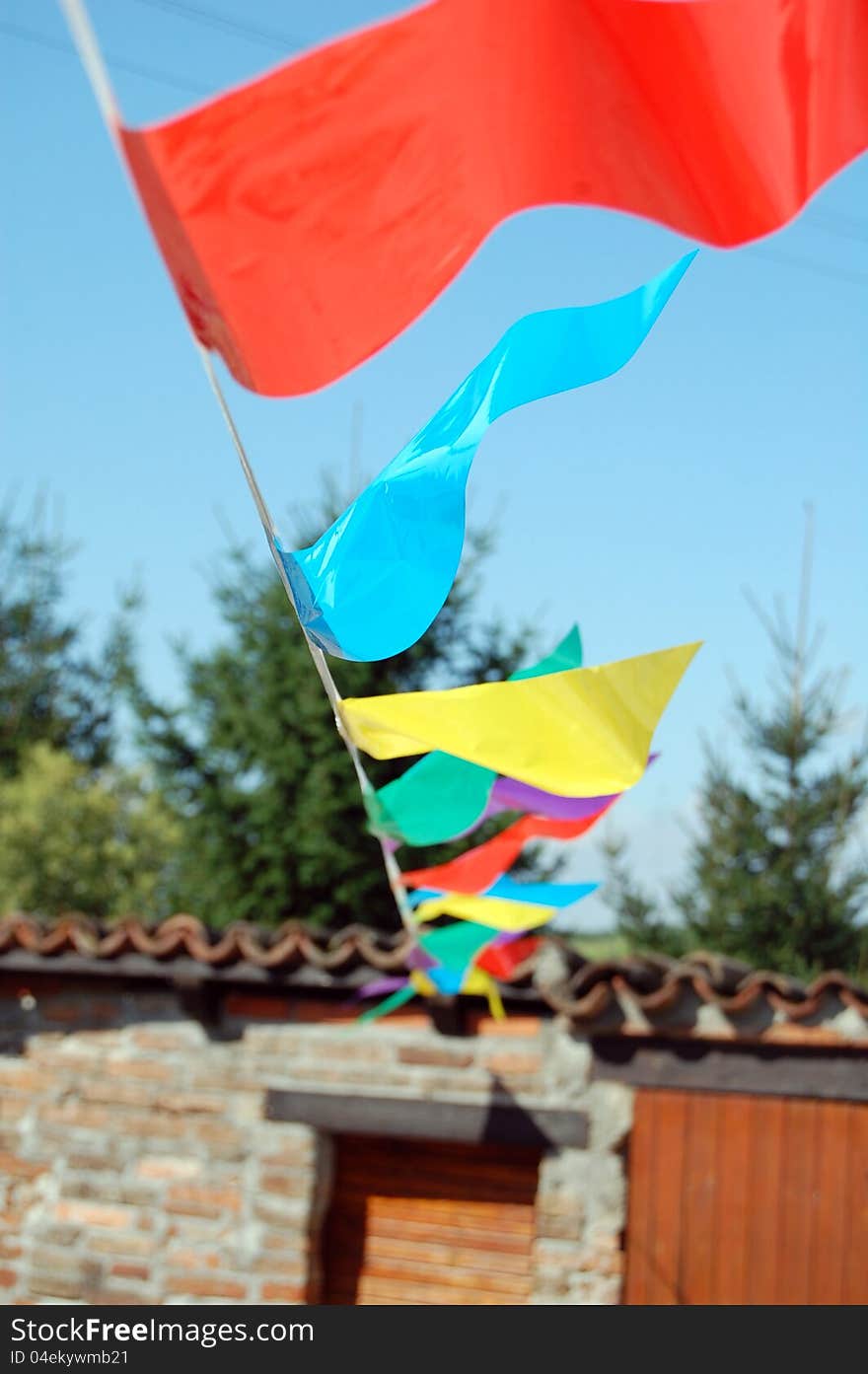 Party flags of various color in the wind