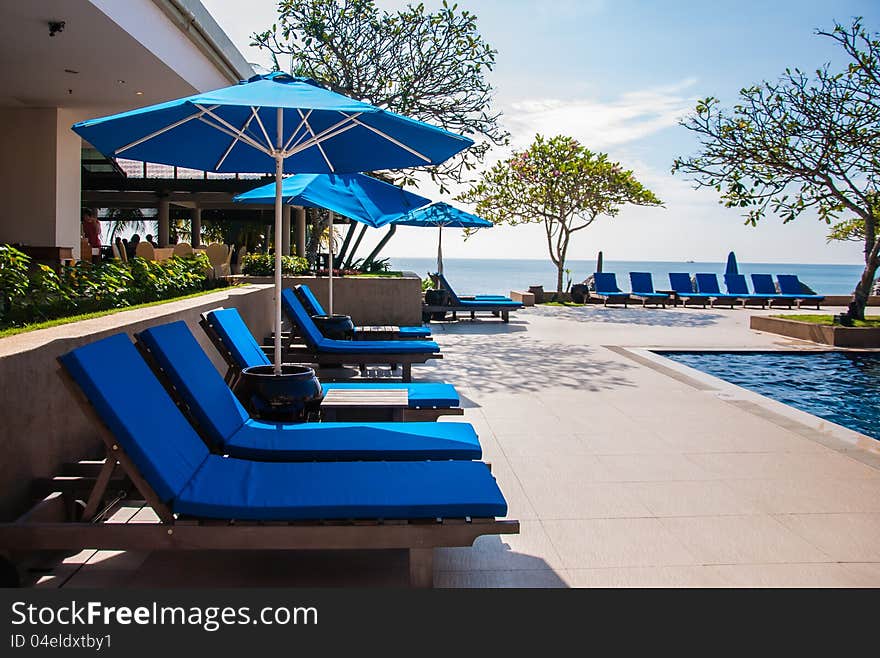 Sun bathing chair at swimming pool