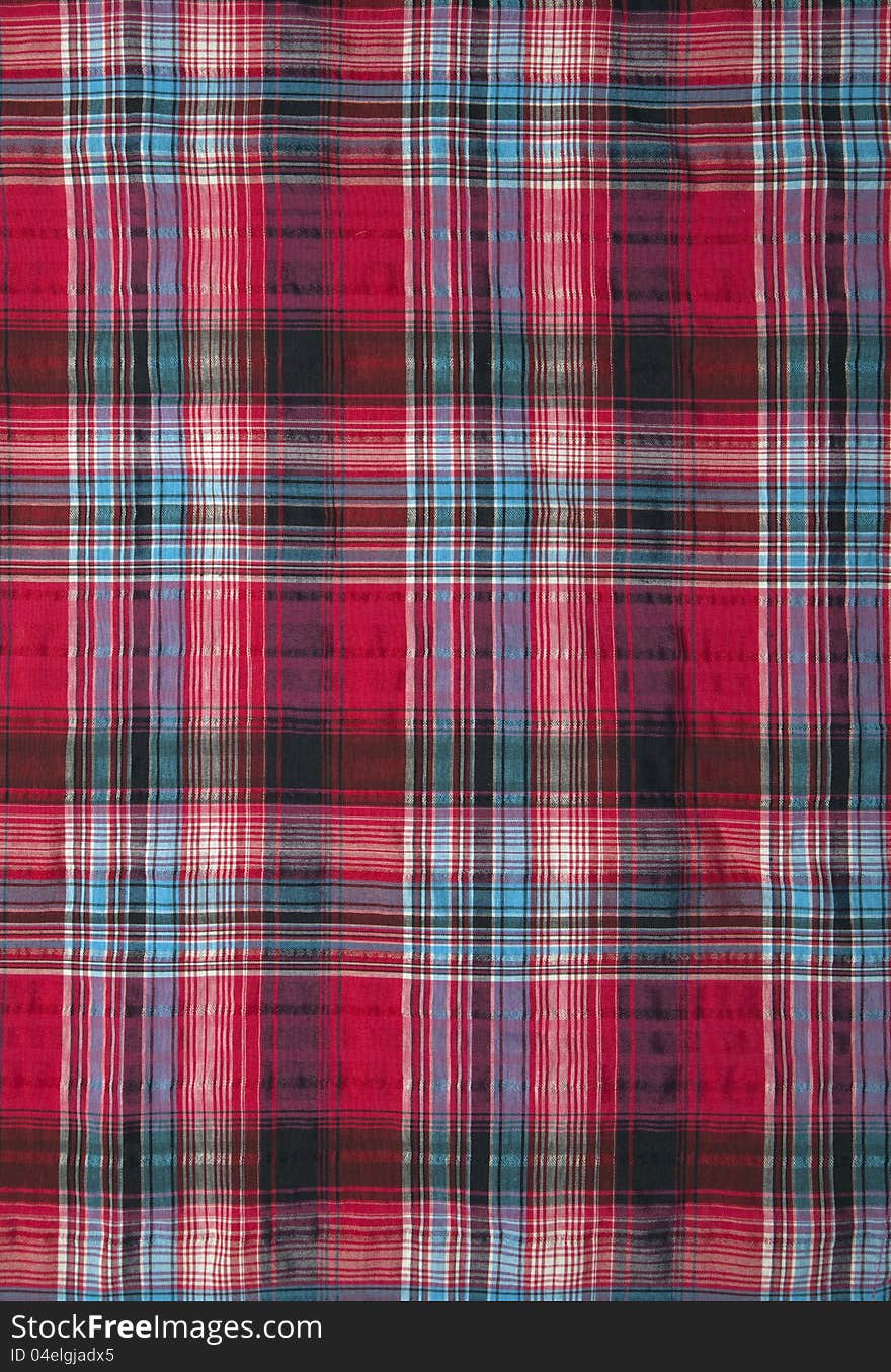 Close-up of a piece of red checked fabric