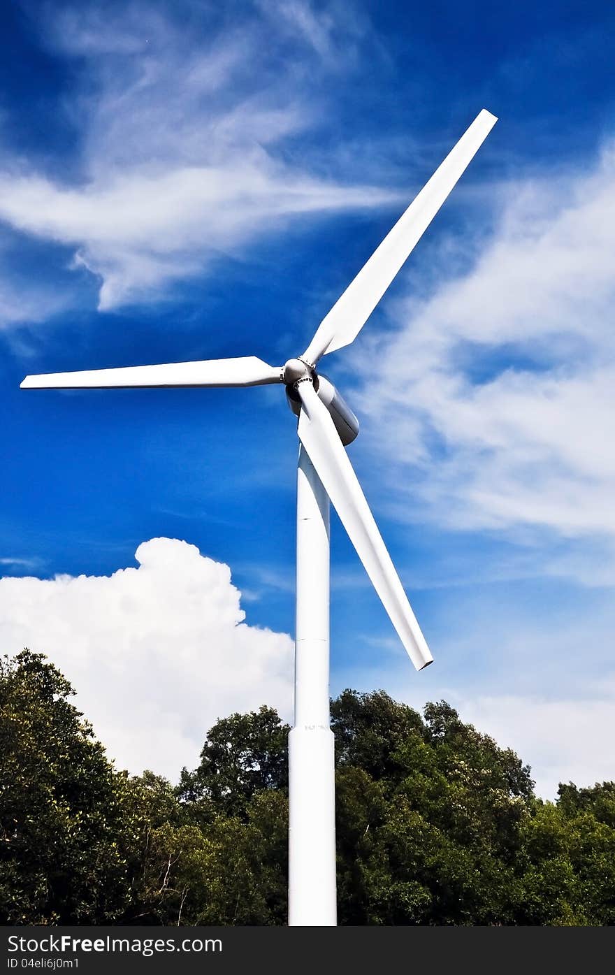 A wind turbine  with blue sky.