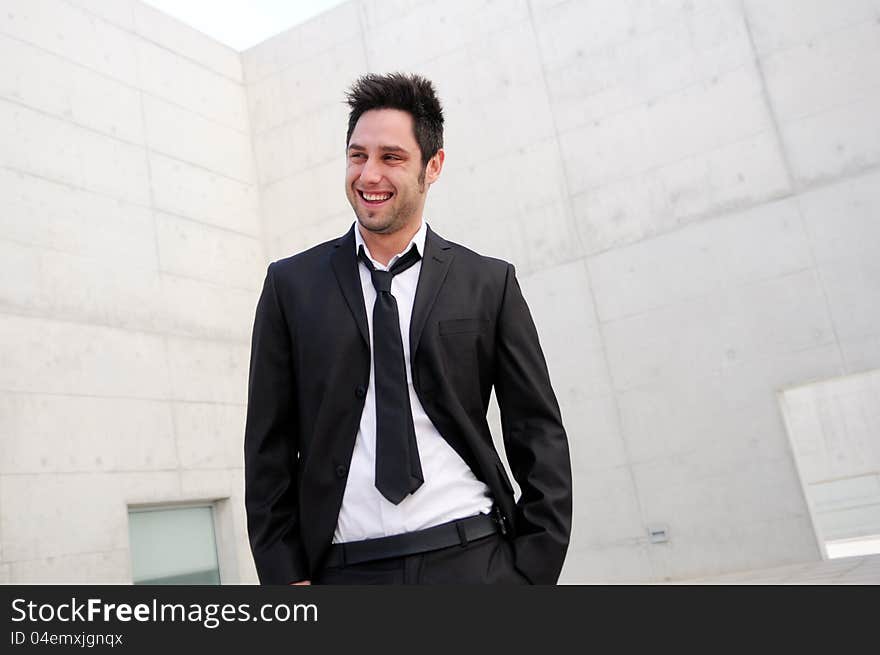 Handsome young business man smiling