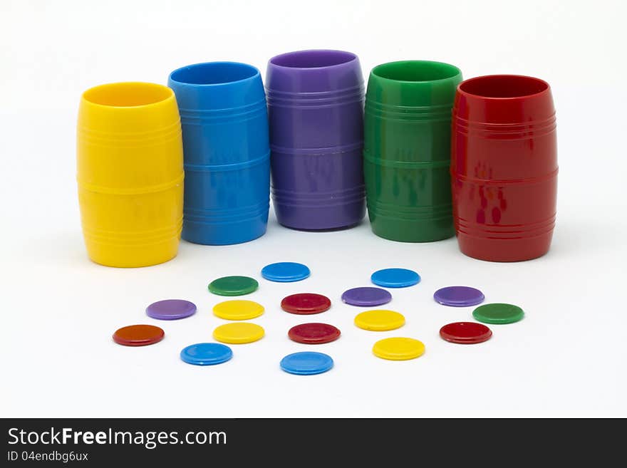 Pieces and dice cups for board games
