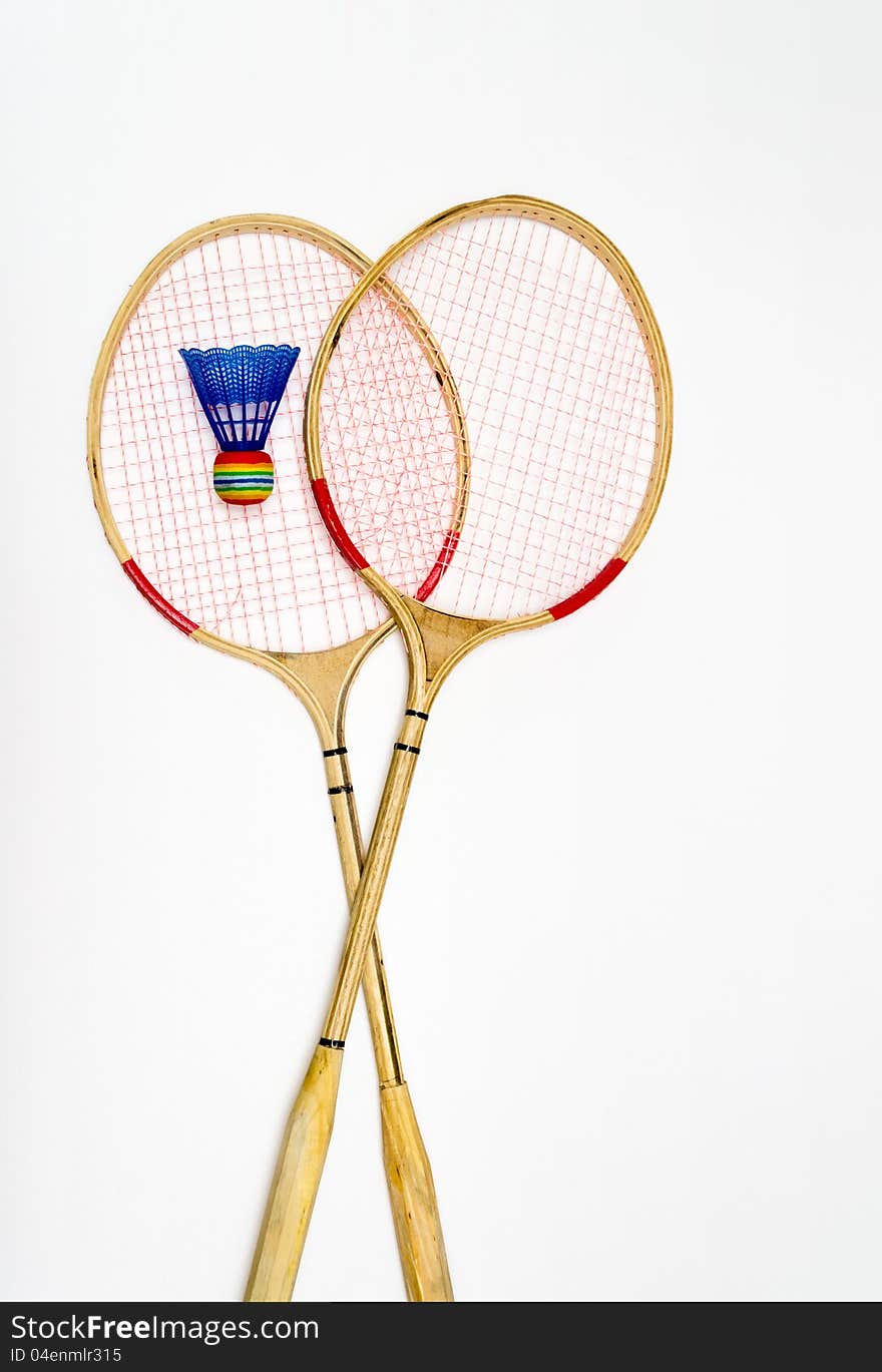 Two rackets for badminton and shuttlecocks