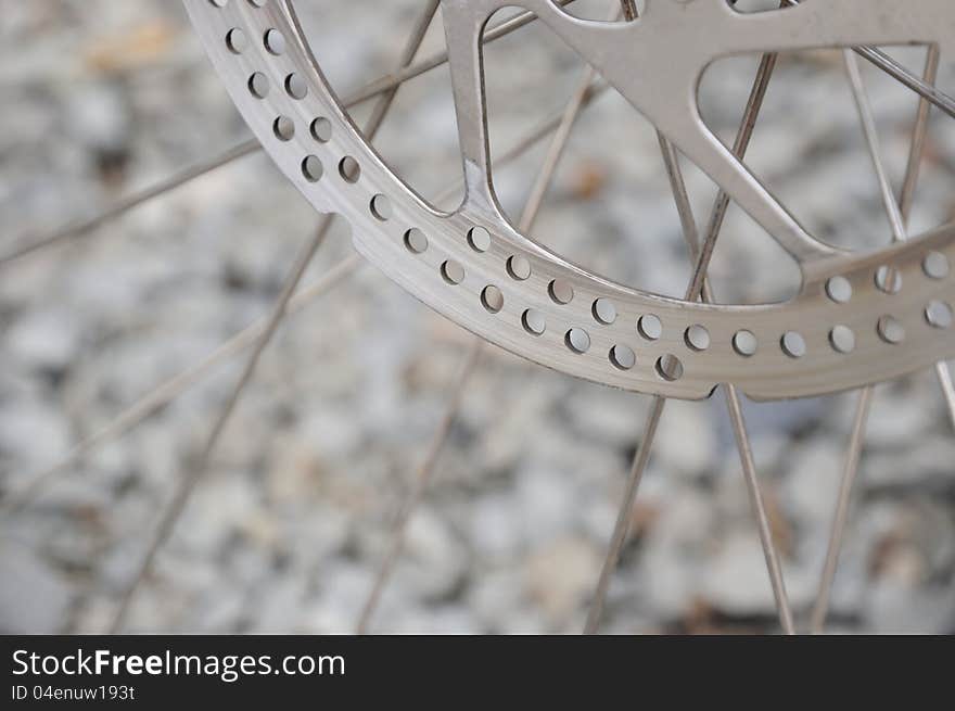 Closeup of bike wheel with brake disk. Closeup of bike wheel with brake disk