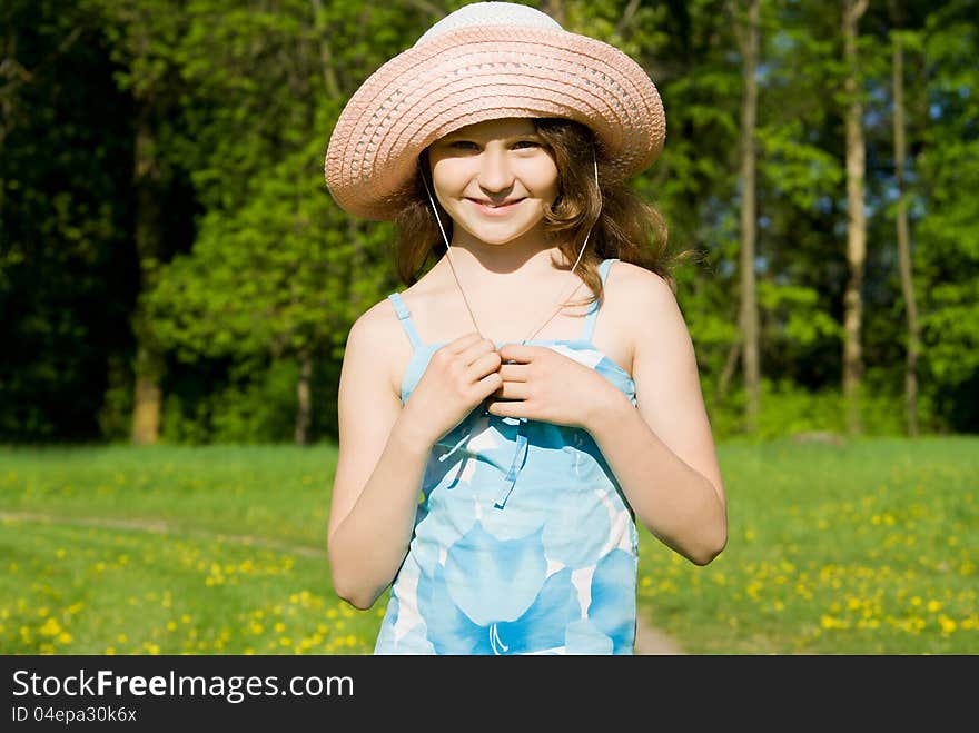 Beautiful girl standing in the field, in nature. Beautiful girl standing in the field, in nature