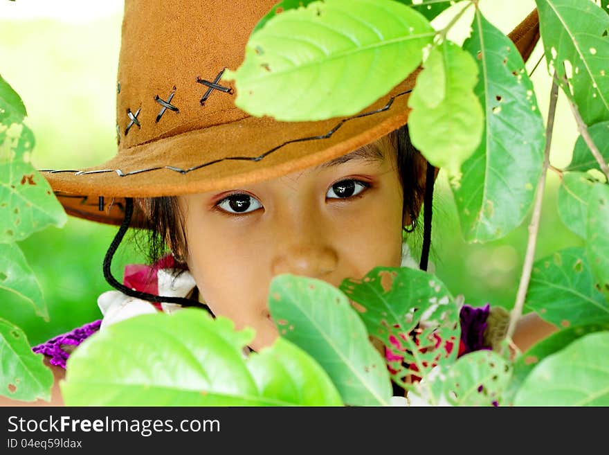 Young girl student post it on the back of the leaves