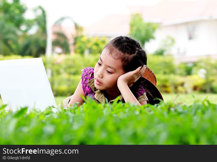 Cute Of Little Girl Play Laptop