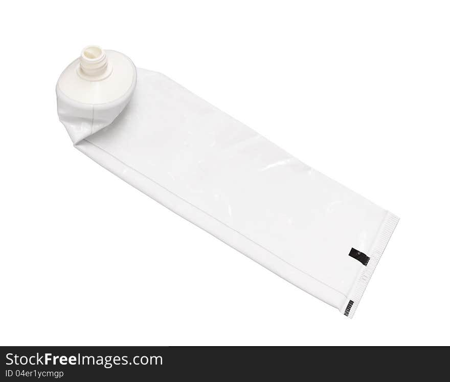 Blank white cream tube isolated on white background. Blank white cream tube isolated on white background