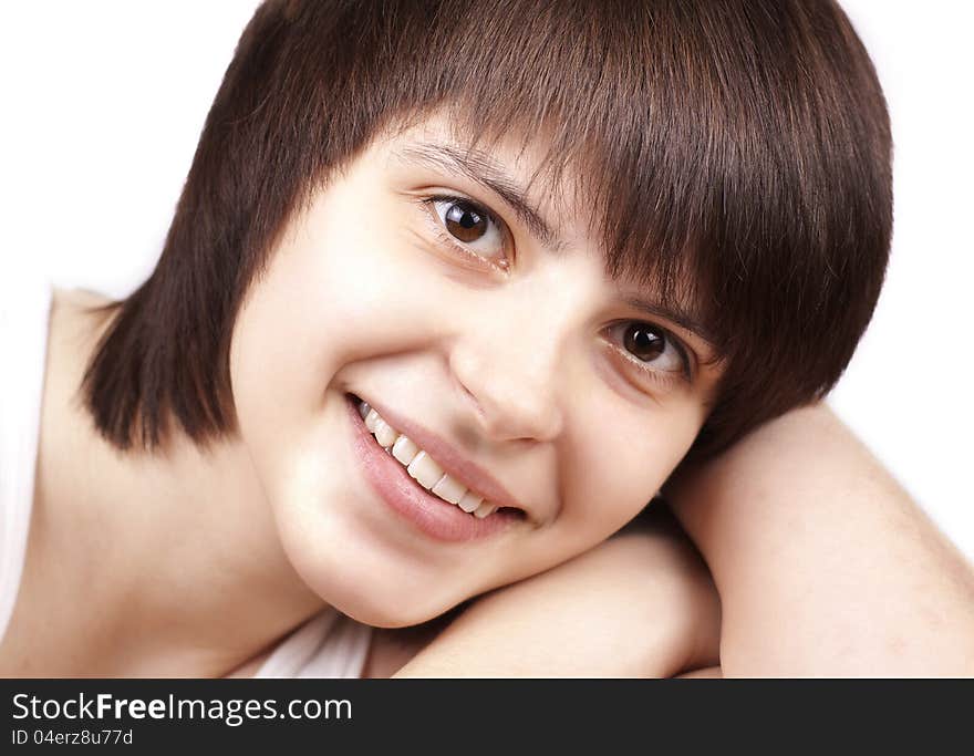 Close up portrait of happy young woman isolated over white