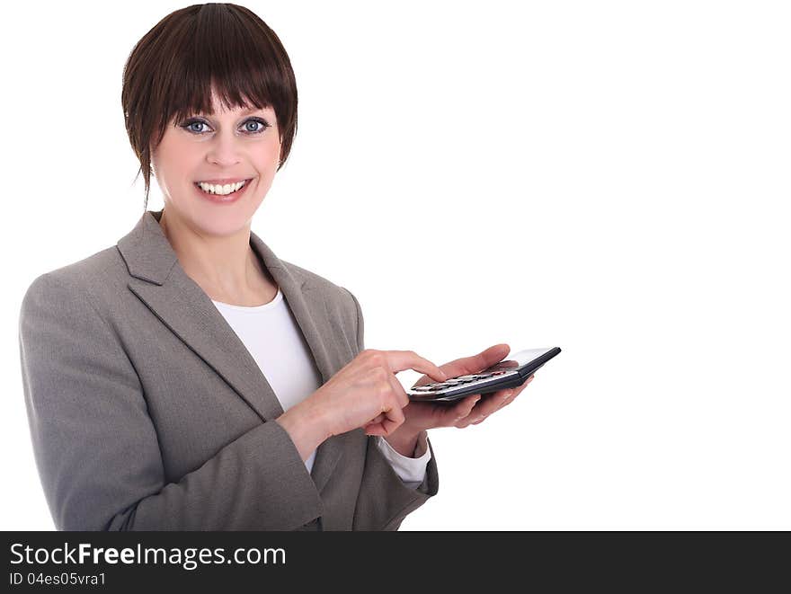 Image of a woman with a calculator in the office. Image of a woman with a calculator in the office