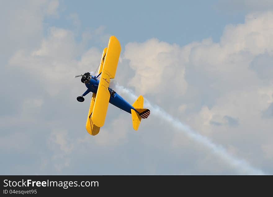 Old Biplane In Flight