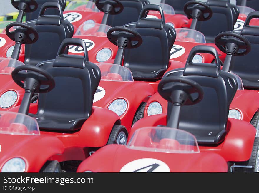 Red toy race cars for kids.