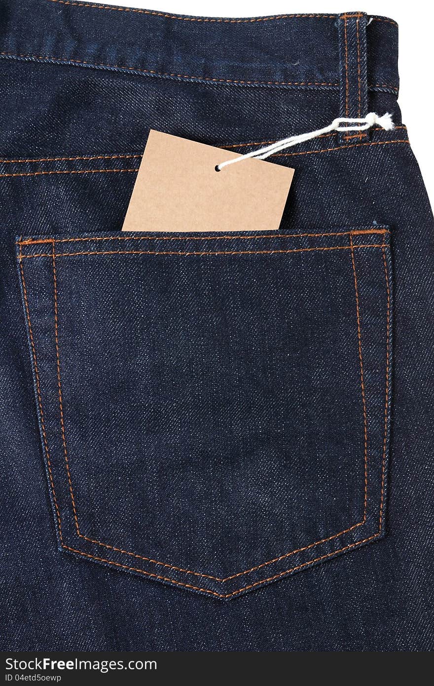 Blank brown tag with rope attached to blue jeans. Blank brown tag with rope attached to blue jeans.